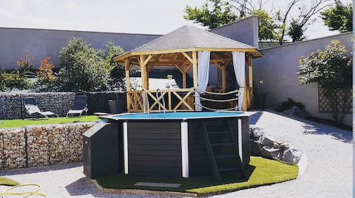 Photograph of a black above ground pool